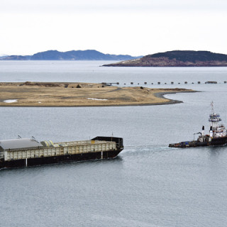 McKeil barge and tug are transporting tanks to the Vale project in Long Harbour, Newfoundland, Canada